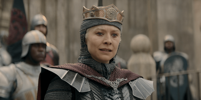 Helaena Targaryen wearing a crown and chainmail armor while standing before armored soldiers in House of the Dragon Season 3.